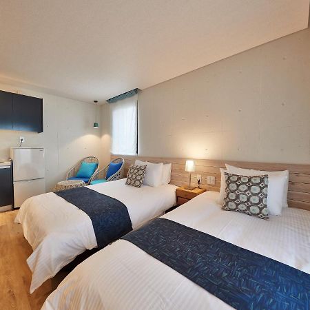 Yomitan Condhotel Nd Екстериор снимка
